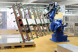 Automazione del caricamento di lastre mediante robotica
